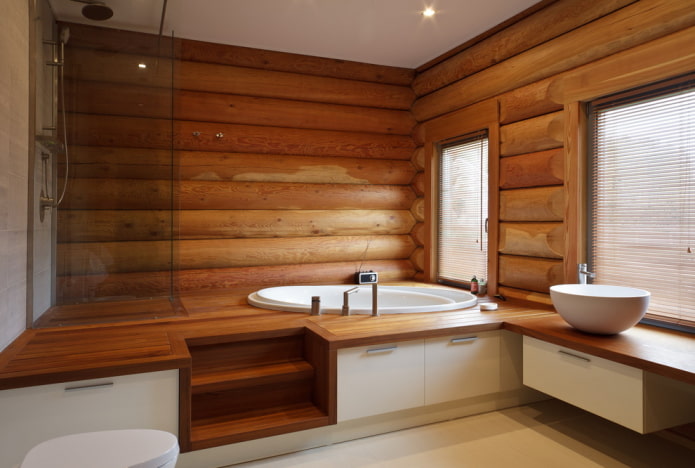 дизайн ванной в интерьере бревенчатого дома